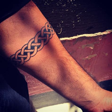 13 Best Armband Tattoo Design Ideas (Meaning and Inspirations) Geometric Tattoo Sleeve Designs. . Band tattoos for men